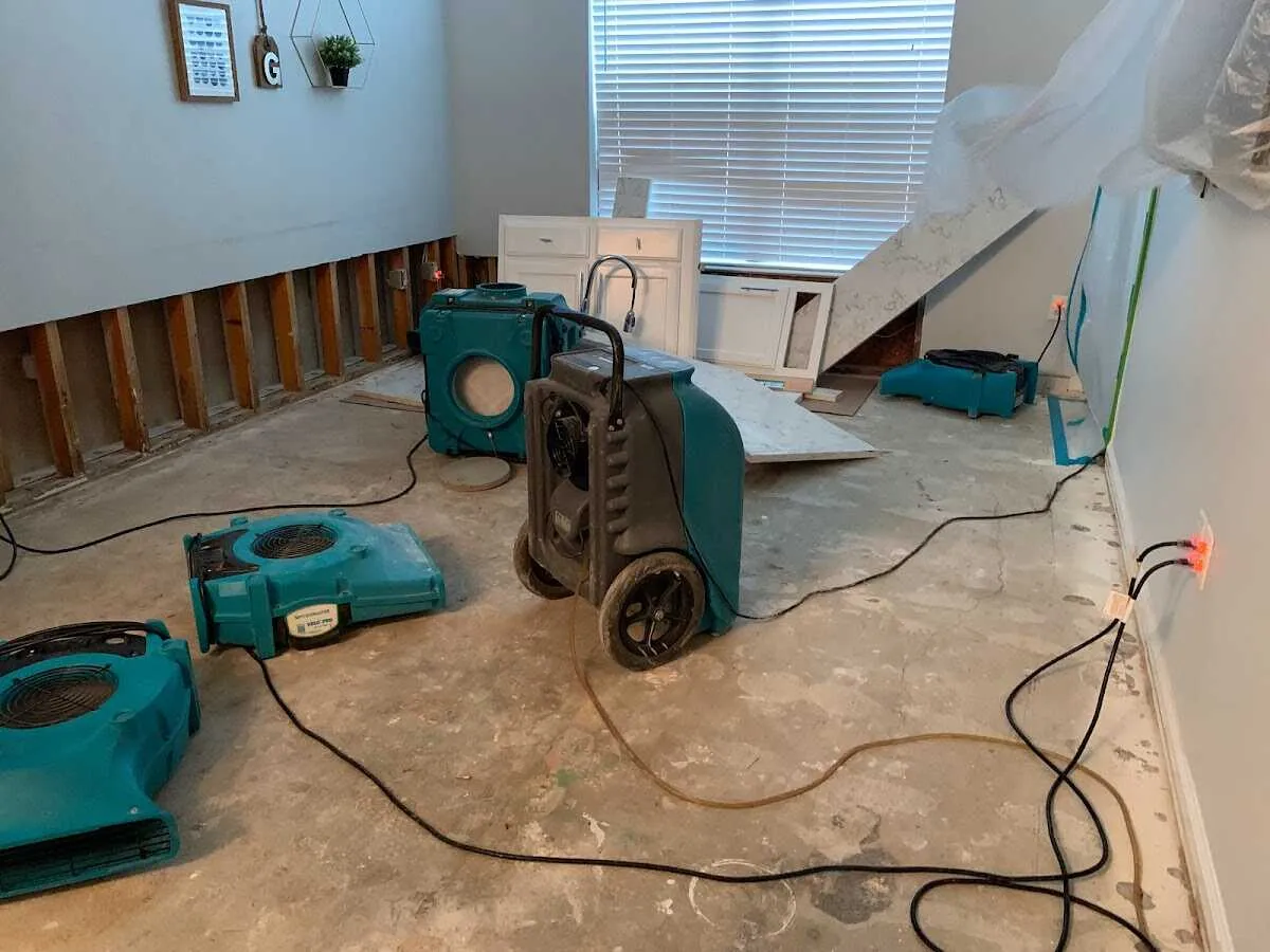 Dehumidifier in flood-cut room for Water Damage Restoration in Southwick